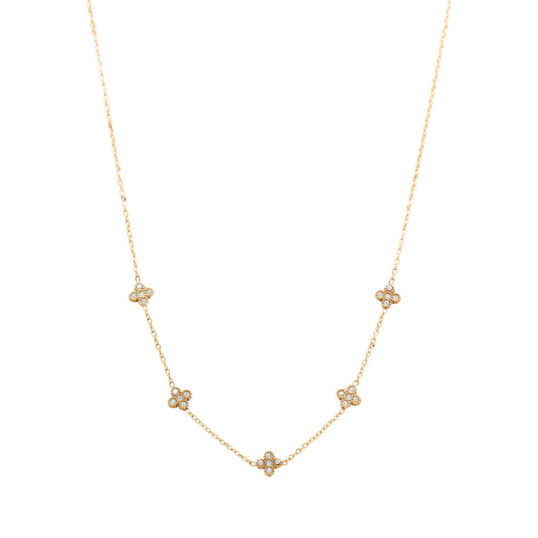 Liana Halskette in gold mit einer filigranen Kette und fünf eingereihten mit Steinen besetzten Kleeblättern.