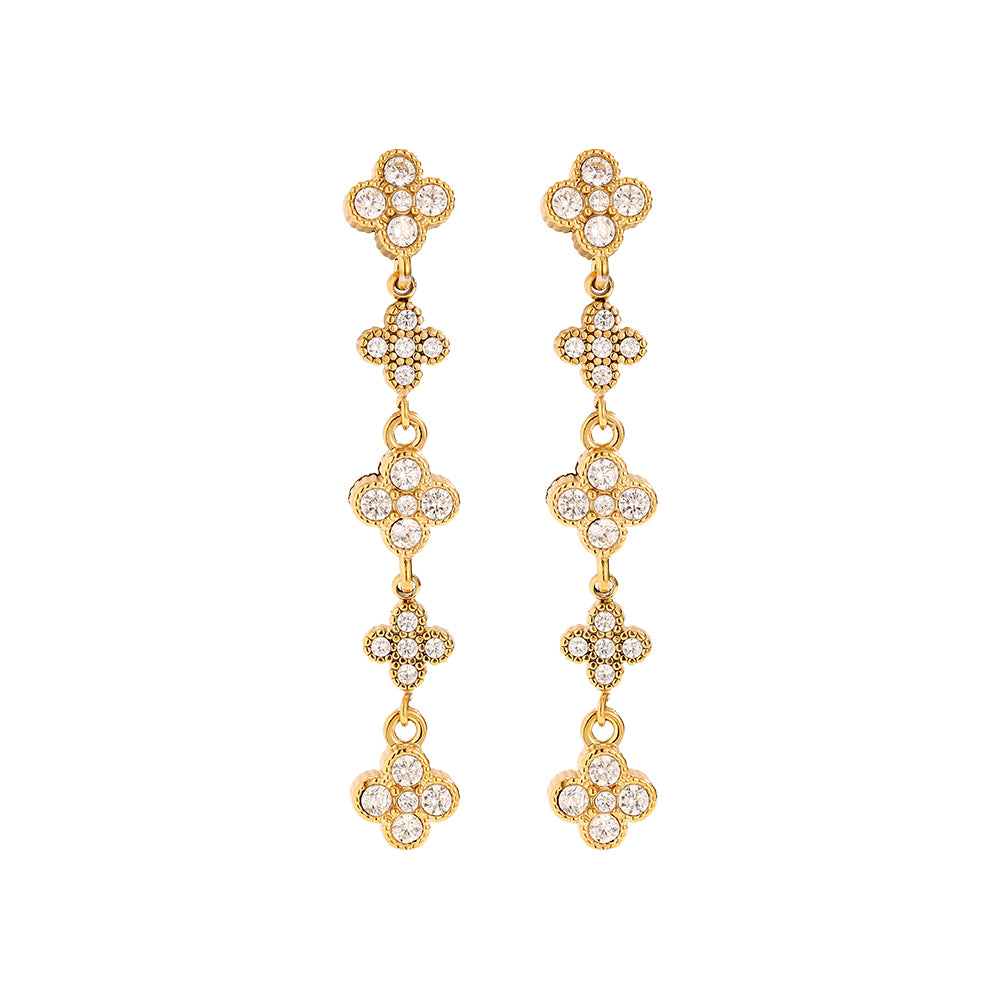 Liana Ohrringe in gold, Hänger aus einer Reihe von fünf Kleeblätter mit Steinen.