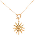 Sol Halskette in gold mit Kugeln und einem Sonnen-Anhänger.