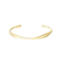 Terra Armreif in gold mit natürlicher Form.